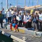 I partecipanti dell'evento organizzato dal Comitato Italiano Paralimpico - Friuli Venezia Giulia rientrati alla base dopo la veleggiata in mare in vista della regata di domenica 12 ottobre